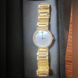 Movado watch stainless steel, water proof, diamonds, sapphire crystal